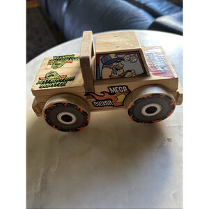 Preowned "Lowe's" Wooden Truck Mega Crush Monster Truck..